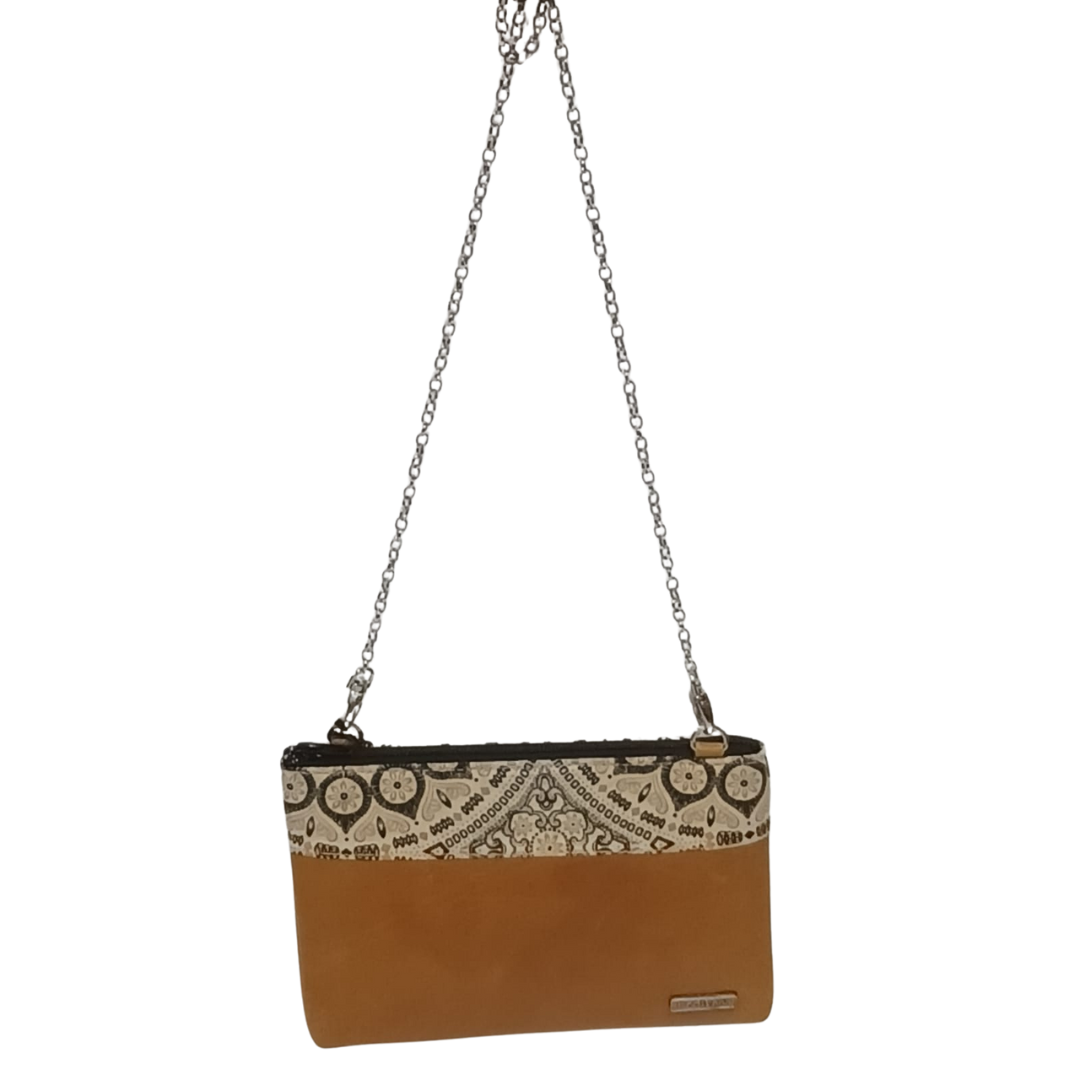 Leather clutch bag with shweshwe print