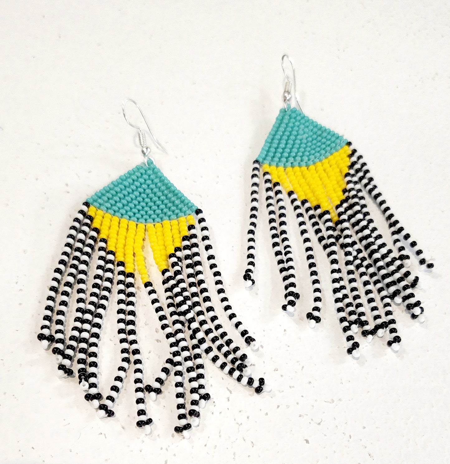 Mila long tail earings