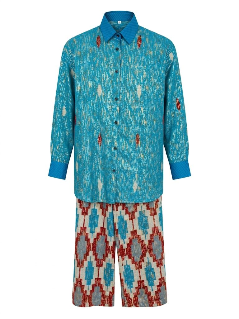 Patterned shirt and pants set on a white background. Traditional Wear